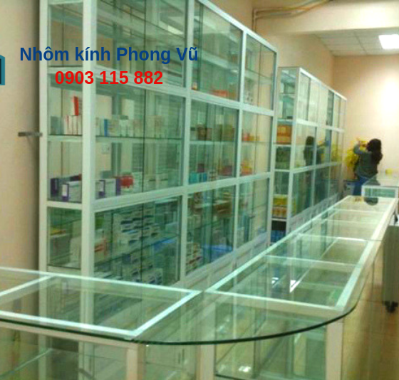 Thi công bộ tủ thuốc bằng nhôm kính màu trắng sứ cửa hàng thuốc chị Nga, Dĩ An, Bình Dương